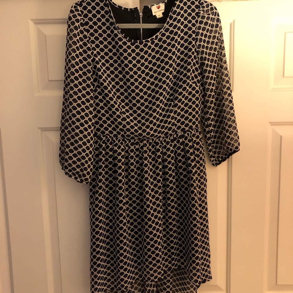 Black, blue, and white high/low dress